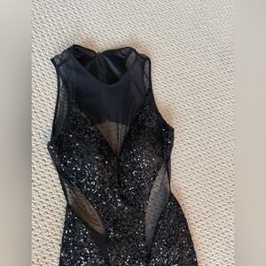 Fabiana Mermaid style formal gown. Sleeveless black sequins.